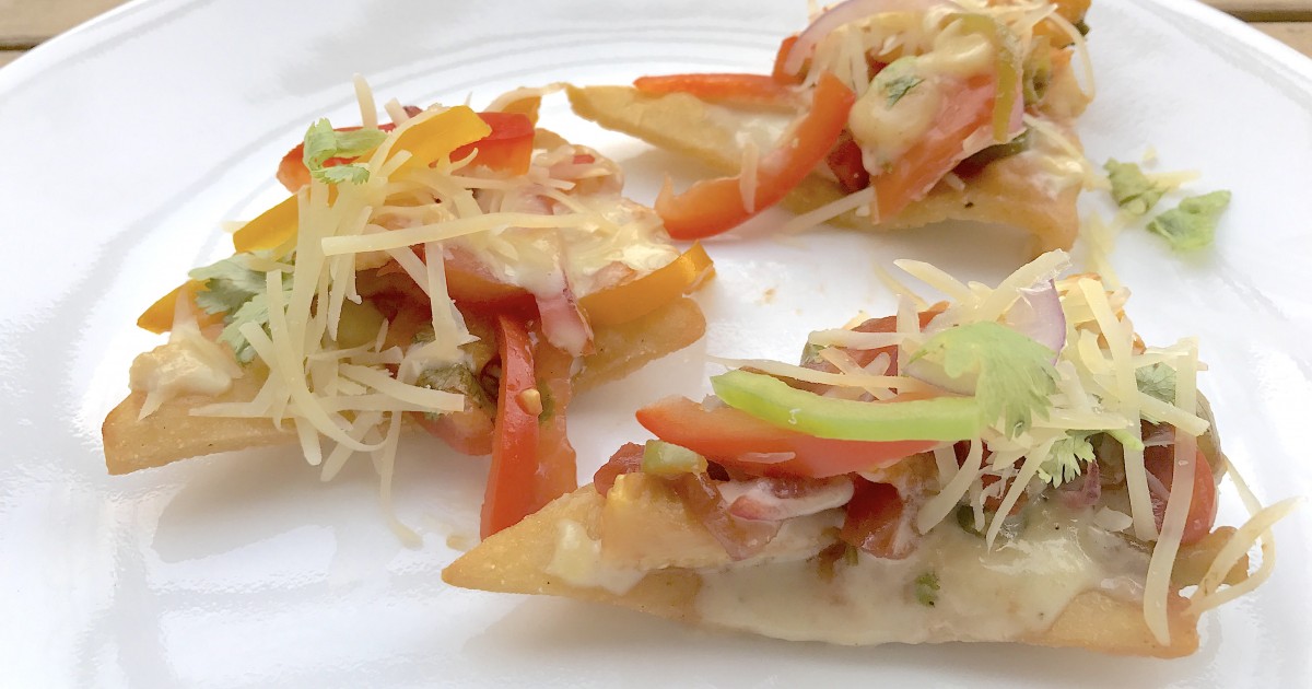 Nachos With White Cream Sauce and Vegetable Topping Recipe